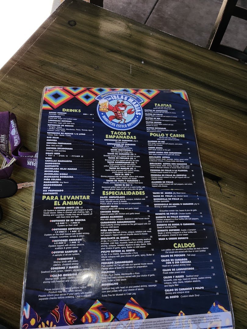 Outdoor patio tables at a Mexican seafood restaurant.