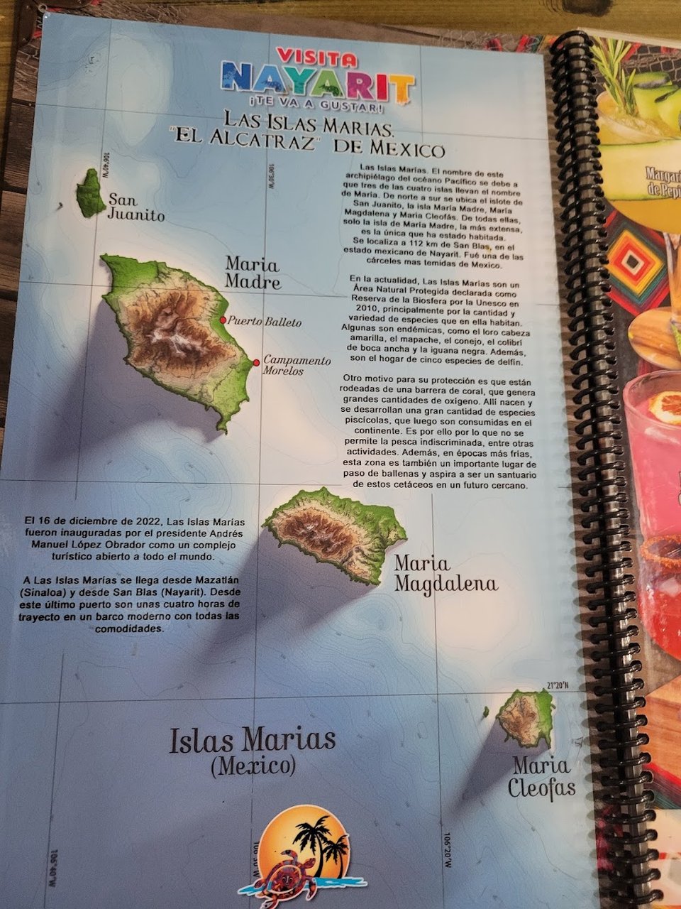 Restaurant menu with appetizers and marisco plates.